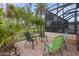 Relaxing patio with comfortable seating and lush greenery at 185 Rotonda E Blvd, Rotonda West, FL 33947