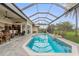 Relaxing pool and patio with open concept design and view of interior at 185 Rotonda E Blvd, Rotonda West, FL 33947