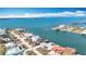 Wide aerial view showcasing waterfront homes and the surrounding waterways at 1924 Mississippi Ave, Englewood, FL 34224