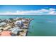 Aerial view of waterfront homes and properties at 1924 Mississippi Ave, Englewood, FL 34224