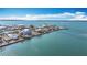 Aerial view of waterfront homes and properties with boat docks at 1924 Mississippi Ave, Englewood, FL 34224
