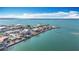 Aerial perspective of waterfront community, featuring various houses and boat docks at 1924 Mississippi Ave, Englewood, FL 34224