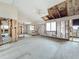 Large bedroom during remodel, featuring new flooring and high ceilings at 1924 Mississippi Ave, Englewood, FL 34224