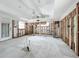 Renovation in progress, large bedroom with high ceilings and new flooring at 1924 Mississippi Ave, Englewood, FL 34224