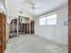 Under renovation, bedroom with high ceilings and new flooring at 1924 Mississippi Ave, Englewood, FL 34224