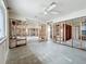 Large unfinished bedroom with ceiling fan at 1924 Mississippi Ave, Englewood, FL 34224