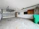 Garage with overhead storage and cabinets at 1924 Mississippi Ave, Englewood, FL 34224