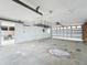 Spacious garage with overhead storage at 1924 Mississippi Ave, Englewood, FL 34224