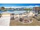 House exterior showcasing a well-maintained lawn and waterfront view at 1924 Mississippi Ave, Englewood, FL 34224
