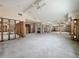 Large living room with high ceilings and a ceiling fan at 1924 Mississippi Ave, Englewood, FL 34224