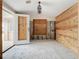 A living room under construction, showcasing the new window and entryway at 1924 Mississippi Ave, Englewood, FL 34224