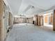 Large living room with high ceilings and a ceiling fan at 1924 Mississippi Ave, Englewood, FL 34224