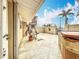 Patio with hot tub and partial water view at 1924 Mississippi Ave, Englewood, FL 34224