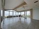 Sunroom with tiled floor and water views at 1924 Mississippi Ave, Englewood, FL 34224