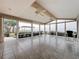 Sunroom with tiled floor and water views at 1924 Mississippi Ave, Englewood, FL 34224