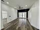 Bedroom with access to the pool, hardwood floors, and a ceiling fan at 19782 Midway Blvd, Port Charlotte, FL 33948