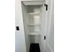 White shelves in a spacious storage closet at 19782 Midway Blvd, Port Charlotte, FL 33948