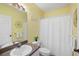 Clean bathroom with single vanity and shower/tub combo at 2121 Heron Lake Dr # 301, Punta Gorda, FL 33983