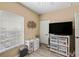 Bedroom with large TV and ample storage at 2121 Heron Lake Dr # 301, Punta Gorda, FL 33983