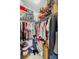Well-organized walk-in closet with ample hanging space at 2121 Heron Lake Dr # 301, Punta Gorda, FL 33983