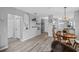 Light-filled dining area with wood table and chairs at 2121 Heron Lake Dr # 301, Punta Gorda, FL 33983