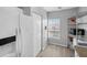 Kitchen with white cabinets, stainless steel appliances and pantry at 2121 Heron Lake Dr # 301, Punta Gorda, FL 33983