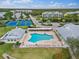 Community pool and tennis/pickleball courts at 2121 Heron Lake Dr # 301, Punta Gorda, FL 33983