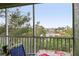 Enjoy tranquil water views from this screened balcony at 2121 Heron Lake Dr # 301, Punta Gorda, FL 33983