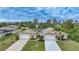Aerial view of two-unit home and surrounding area at 215 Australian Dr, Rotonda West, FL 33947