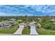 Aerial view of two-unit home with driveways and landscaping at 215 Australian Dr, Rotonda West, FL 33947