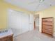 Bright bedroom with large closet and neutral walls at 215 Australian Dr, Rotonda West, FL 33947