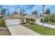 Two-unit property with attached garages at 215 Australian Dr, Rotonda West, FL 33947