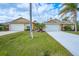 Two-unit property with attached garages at 215 Australian Dr, Rotonda West, FL 33947