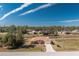 Single-Gathering home with canal views and lush landscaping at 2194 Wenona Dr, North Port, FL 34288