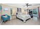 Bright bedroom with pool view and sliding door access at 2194 Wenona Dr, North Port, FL 34288