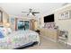Spacious bedroom with tiled floors and pool view at 2194 Wenona Dr, North Port, FL 34288