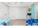 Bedroom with two twin beds and large closet at 2194 Wenona Dr, North Port, FL 34288