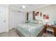 Bedroom with coastal decor and ceiling fan at 2194 Wenona Dr, North Port, FL 34288