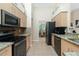 Modern kitchen, granite counters, stainless steel appliances at 2194 Wenona Dr, North Port, FL 34288