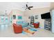 Spacious living room with comfortable seating and access to the front entry at 2194 Wenona Dr, North Port, FL 34288