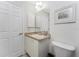 Small bathroom with sink and toilet at 241 Marker Rd, Rotonda West, FL 33947