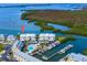Aerial view of waterfront community with docks and boat slips at 2424 Placida Rd # C101, Englewood, FL 34224