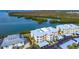 Aerial view showcasing waterfront location of the condo building at 2424 Placida Rd # C101, Englewood, FL 34224