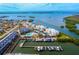 Aerial view of waterfront community with pool and boat docks at 2424 Placida Rd # C101, Englewood, FL 34224