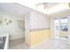 Charming dining area with yellow walls and access to a patio at 2424 Placida Rd # C101, Englewood, FL 34224