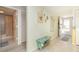 Charming entryway with light walls, coastal decor, and bench at 2424 Placida Rd # C101, Englewood, FL 34224
