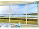 Waterfront views from this screened sunroom at 2424 Placida Rd # C101, Englewood, FL 34224