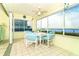 Sunroom with water views and seating area at 2424 Placida Rd # C101, Englewood, FL 34224