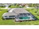 Aerial view showcasing home's attractive pool and landscaping at 252 Medalist Rd, Rotonda West, FL 33947
