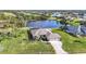 Expansive home with a private pool and gorgeous lakefront lot at 252 Medalist Rd, Rotonda West, FL 33947